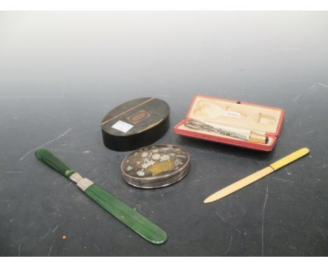 Two inlaid tortoiseshell boxes, an enamel and ivory letter opener, a jade letter opener, and a cased pair of scissors and thi