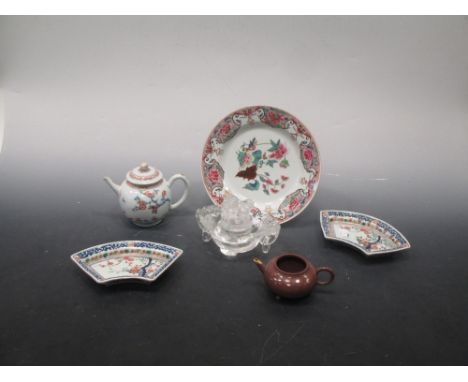 Six Oriental items: A Chinese porcelain teapot and cover, Qianlong, decorated with prunus, 13cm high. A Famille rose plate 18