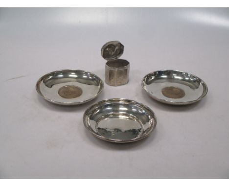 A Dutch metalwares snuff box together with an English hallmarked silver dish and a pair of silver dishes mounted with Churchi