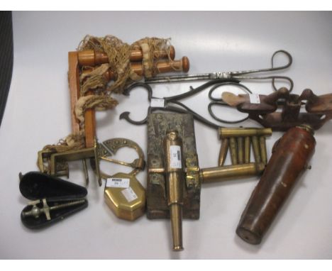 A brass model of a cannon, 7.5in long, on a wooden base and other items including a hunting flask, a leather flask case A/F, 