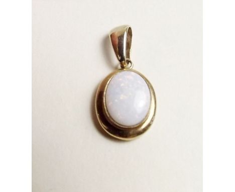 A 9 carat gold and opal pendant 