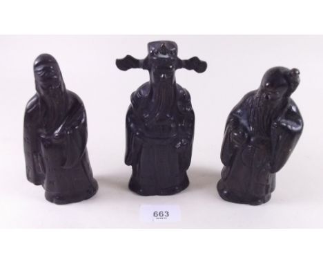 A set of three Chinese bronze figures, 15cm 