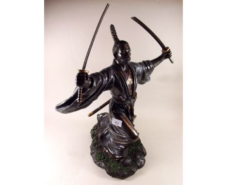 A large bronze finish Japanese figure with sword , 49cm high