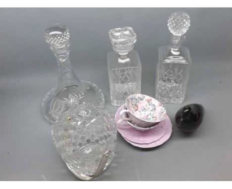 Mixed Lot: three cut glass decanters, cut glass bowl, Art Glass bird and two Shelly cups and saucers 