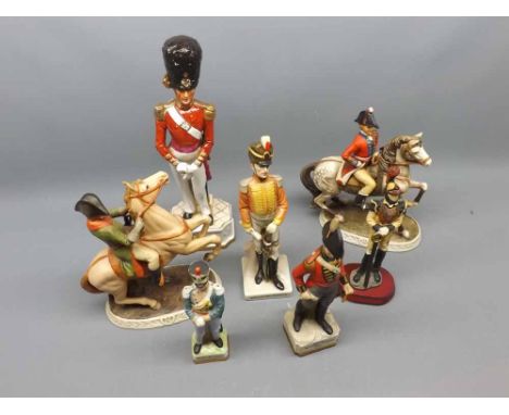 Collection of seven various assorted ceramic and composition models: soldiers, beefeater etc including two on horseback  