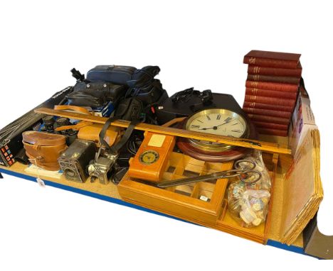 Collection of cameras, books, radio, clock, tripod, etc.