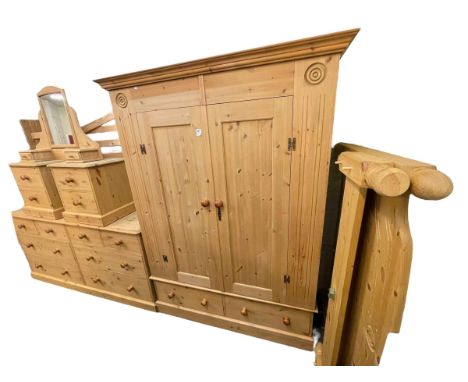 Six piece pine bedroom suite comprising two door wardrobe with two base drawers, 199cm by 146cm by 56cm, chest of four short 