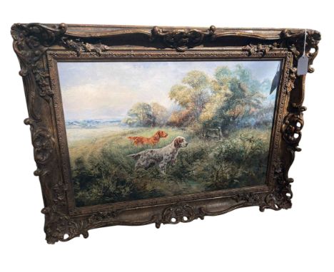 Henry Wilkinson (1921-2011), Two Alert Gun Dogs, oil on canvas, signed lower left, 37cm by 55cm, in gilt frame *ARR (Artists 
