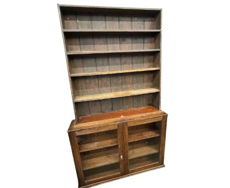 Pitch pine two door glazed cabinet associated shelf back, pine Delft rack, plate rack and Victorian wall clock (5).