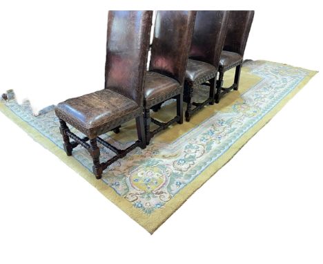 Chinese carpet with floral pattern on yellow ground 3.56 by 2.75.