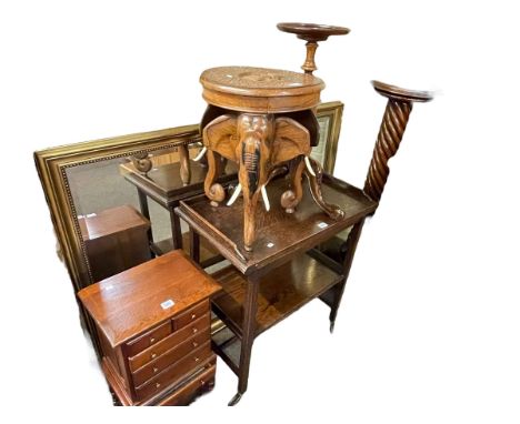 Oak mini chest of two short above four long drawers, carved hardwood elephant stool, tripod wine table, twist column torchere