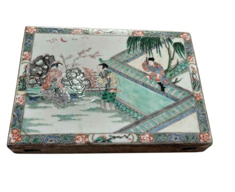 Chinese famille rose double sided pottery tile decorated with figures, 25cm by 18.5cm.