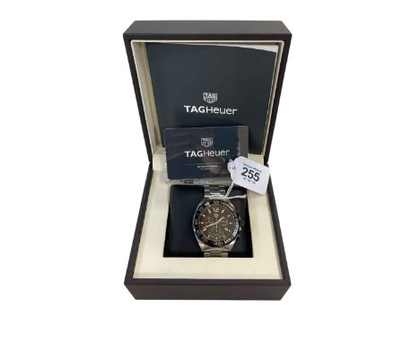 Tag Heuer wristwatch 'Formula One' with receipt, guarantee card, instructions and box.