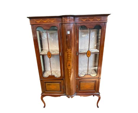Edwardian inlaid mahogany vitrine having two glazed panel doors above two cupboard doors on cabriole legs, 181cm by 125cm by 