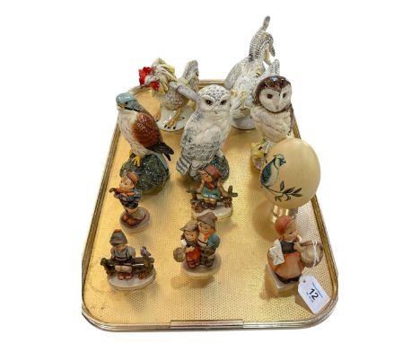 Beswick owl and kestrel Whyte & Mackay whisky bottles, two Continental cockatoo's and five Hummel figures.