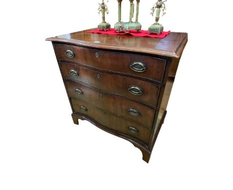 19th Century mahogany serpentine front chest of four long drawers on bracket feet, 91cm by 89cm by 57cm.