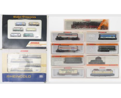 A collection of boxed Arnold N-gauge model railway locomotives and stock, to include 0165 Jahres-Sonderzug 1989 and 0144 Rhei