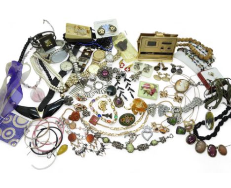 A large collection of costume jewellery to include a German Christian Dior rose brooch, Miracle bracelet, vintage Gents Smith