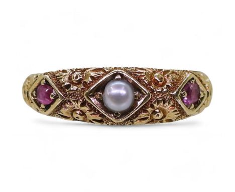 A Victorian pearl and ruby ring engraved with flowers, hallmarked London 1873, size O1/2, weight 2.8gms Condition Report:appe