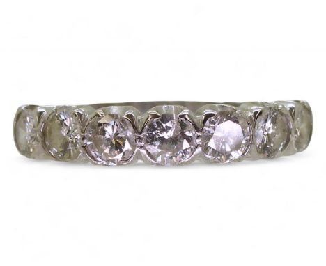 A seven stone diamond ring, mounted in 18ct white gold set with estimated approx 1.20cts of brilliant cut diamonds. Size R, w