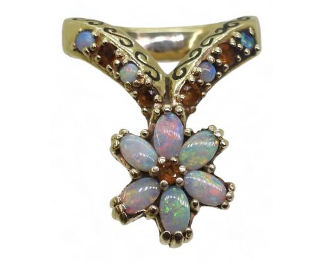 A bespoke and unusual opal and citrine flower ring, finger size approx Q1/2, weight 12.5gms Condition Report:Available upon r
