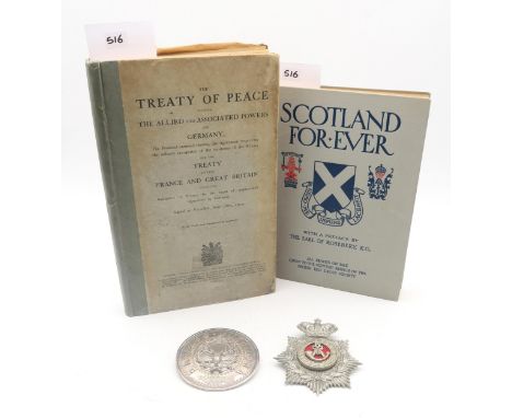 A 1st Volunteer Battalion Durham Light Infantry helmet plate; together with a large "Always Faithful" plaid brooch; a copy of