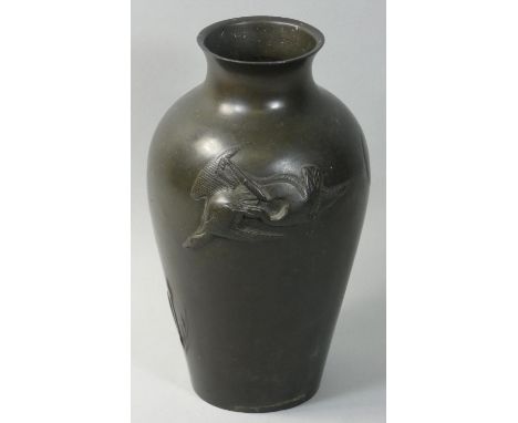 A Japanese bronze baluster vase, of baluster form with bird decoration, height 23 cm. 