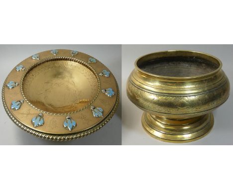 An Arts &amp; Crafts brass and enamel pedestal bowl, with rope twist border, applied pale blue enamel fleur de lis, and engra