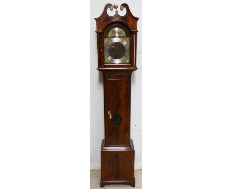 A Georgian style mahogany longcase clock, the 11" gilt dial with silvered chapter ring, signed Comitti, London, Made in Londo