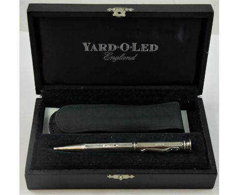 Yard o Led, a silver Regent propelling pencil, with engine turned decoration, leather case, presentation box. 