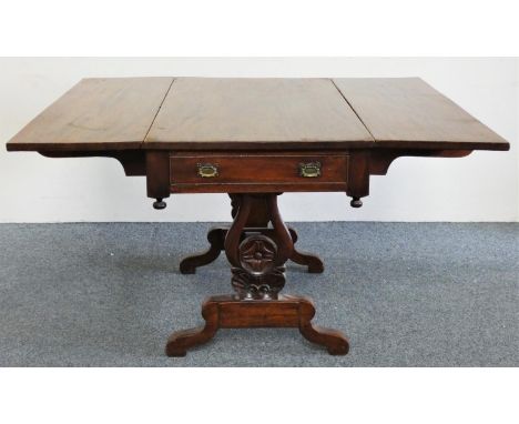 A Georgian mahogany sofa table, with single frieze drawer, raised on lyre supports with turned stretcher, 130 cm extended x 1