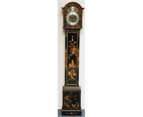 J.W. Benson, a brass carriage time piece, the white enamel dial signed, key, 15 cm with handle raised. 