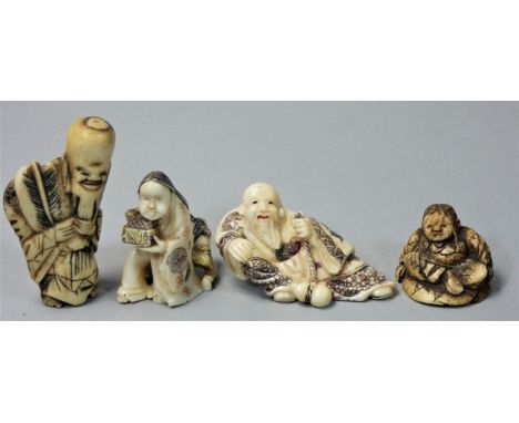 Four Japanese resin Netsuke, one as a lounging man (4). 