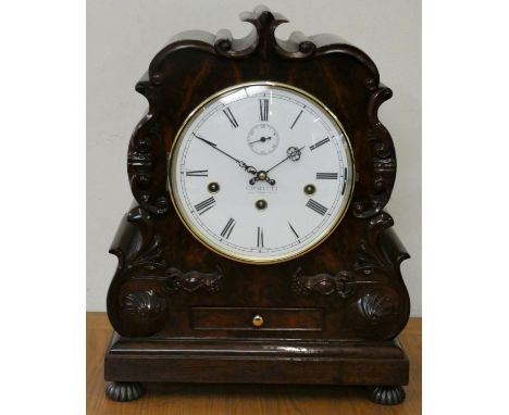 Comitti, a Regency style mahogany chiming mantle clock, the white enamel dial, signed, with subsidiary seconds dial and chime