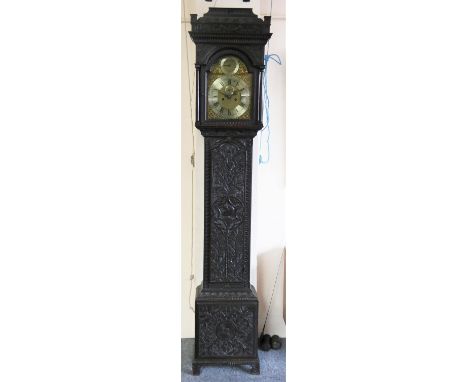 John Smith, York, (active 1750-1764), a George III/Victorian carved dark oak eight day longcase clock, The 12" gilt dial with