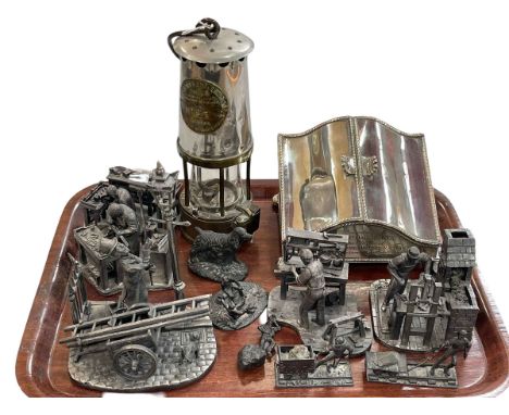 Silver plated desk box, Protector Type 6 miners lamp, and Evergreen and other sculptures of vintage scenes.