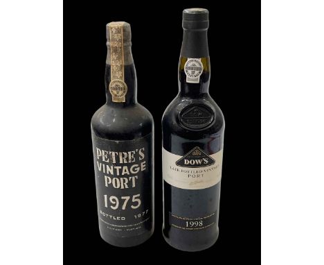 Two bottles of port, Petre's 1975 vintage, and Dows 1998.