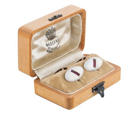 A PAIR OF FABERGE GOLD, GUILLOCHE ENAMEL AND RUBY CUFFLINKS, WORKMASTER HENRYK WIGSTROM, ST. PETERSBURG, 1908-1917with transl