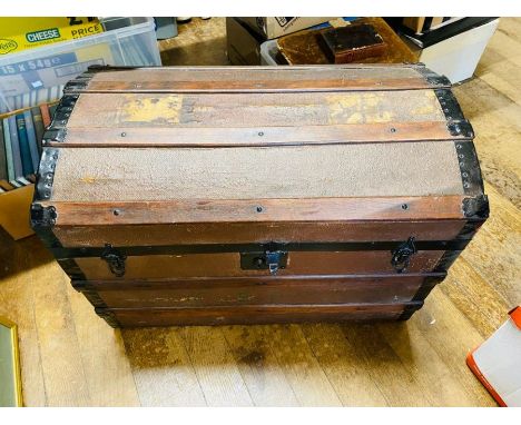 A wooden steamer trunk, c. 1930, bearing White Star P.O. label, housing a quantity of modern Titanic memorabilia inc. film po