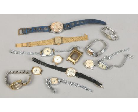 A tin of mostly ladies manual wristwatches including Timex, Avia and Tissot automatic.