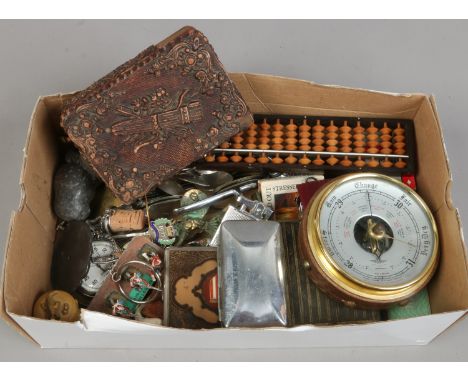 A box of collectables including a barometer, Sekonda stopwatch, collectors spoons, lighters etc.