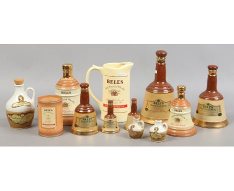 A collection of Bells breweriana to include Old Scotch Whisky jug, Whisky decanters and liqueur jugs etc.
