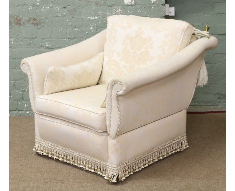 A cream upholstered Milbrook double droparm three seat sofa along with matching arm chair raised on easy free casters.