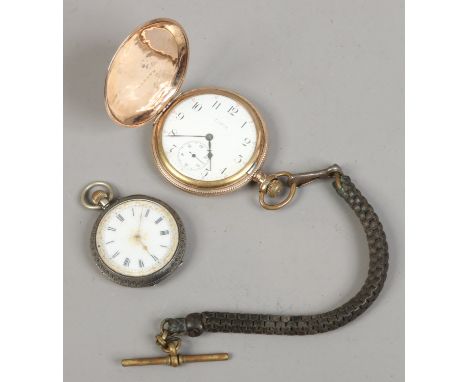 A Swiss silver fob watch with white enamel dial, along with a yellow metal Elgin pocket watch.