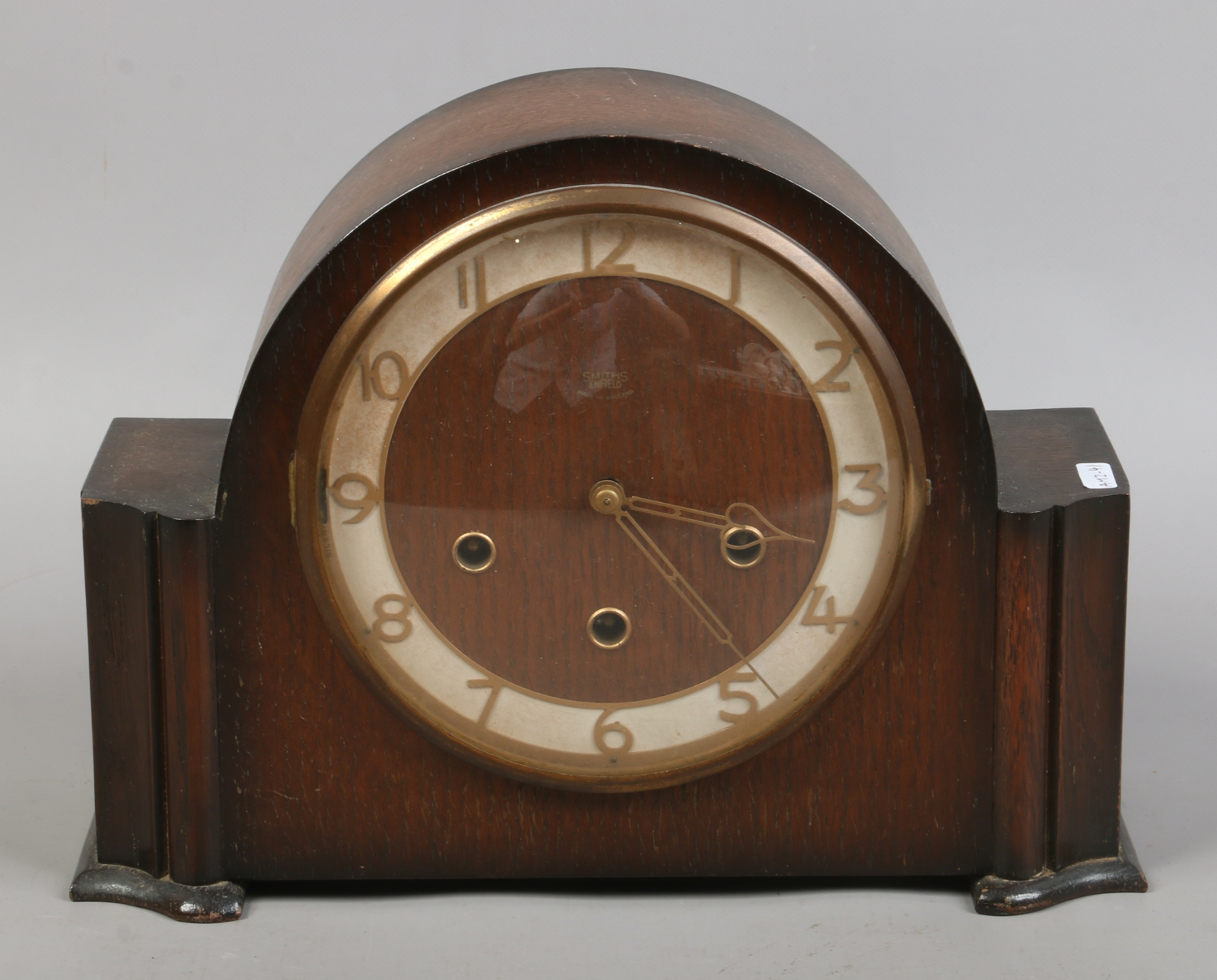 An oak cased Smiths Enfield Westminster chime mantle clock with ...