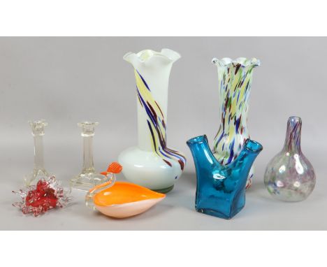 Four art glass vases, an art glass basket, glass model of a sea urchin and a pair of moulded glass candlesticks.