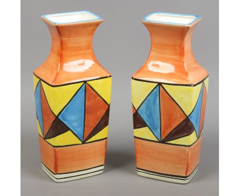 A pair of Clarice Cliff style decorative mantle vases.