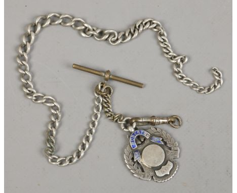 A Victorian silver and enamel medal on silver Albert chain.