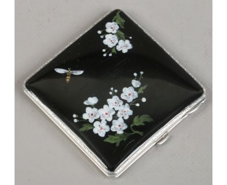 A silver and enamel powder compact assayed Birmingham 1937 by Mappin & Webb.