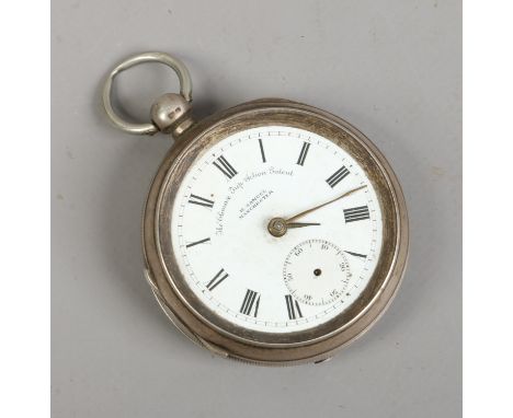 An Edwardian silver pocket watch assayed Chester 1901 with white enamel dial and Roman numeral markers. Condition Report. To 